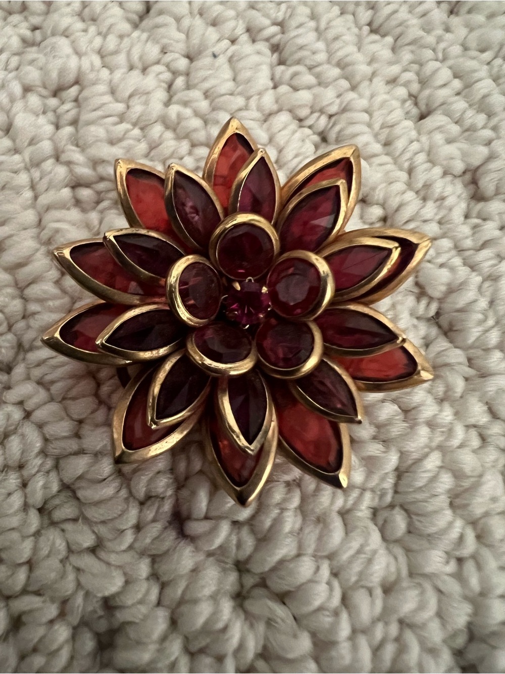 Avon Gold-Tone Floral Brooch with Red and Burgundy Stones